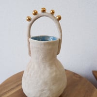 CURIOUS CLAY FLOWER VASE