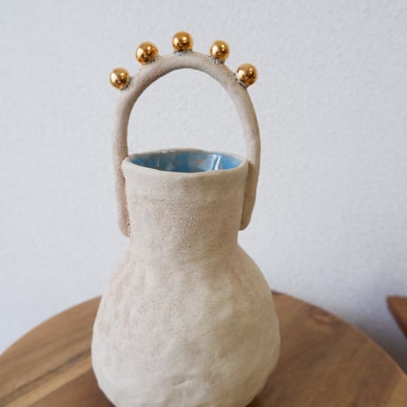 CURIOUS CLAY FLOWER VASE