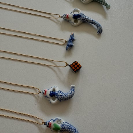 Tiny ceramic mermaid