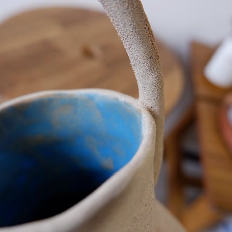 CURIOUS CLAY FLOWER VASE