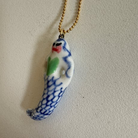 Tiny ceramic mermaid