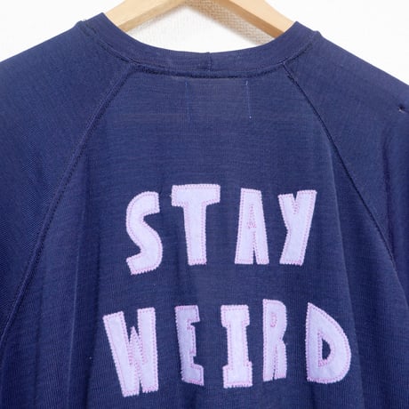 STAY WEIRD STRETCH TEE