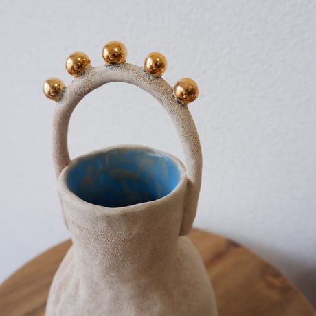 CURIOUS CLAY FLOWER VASE