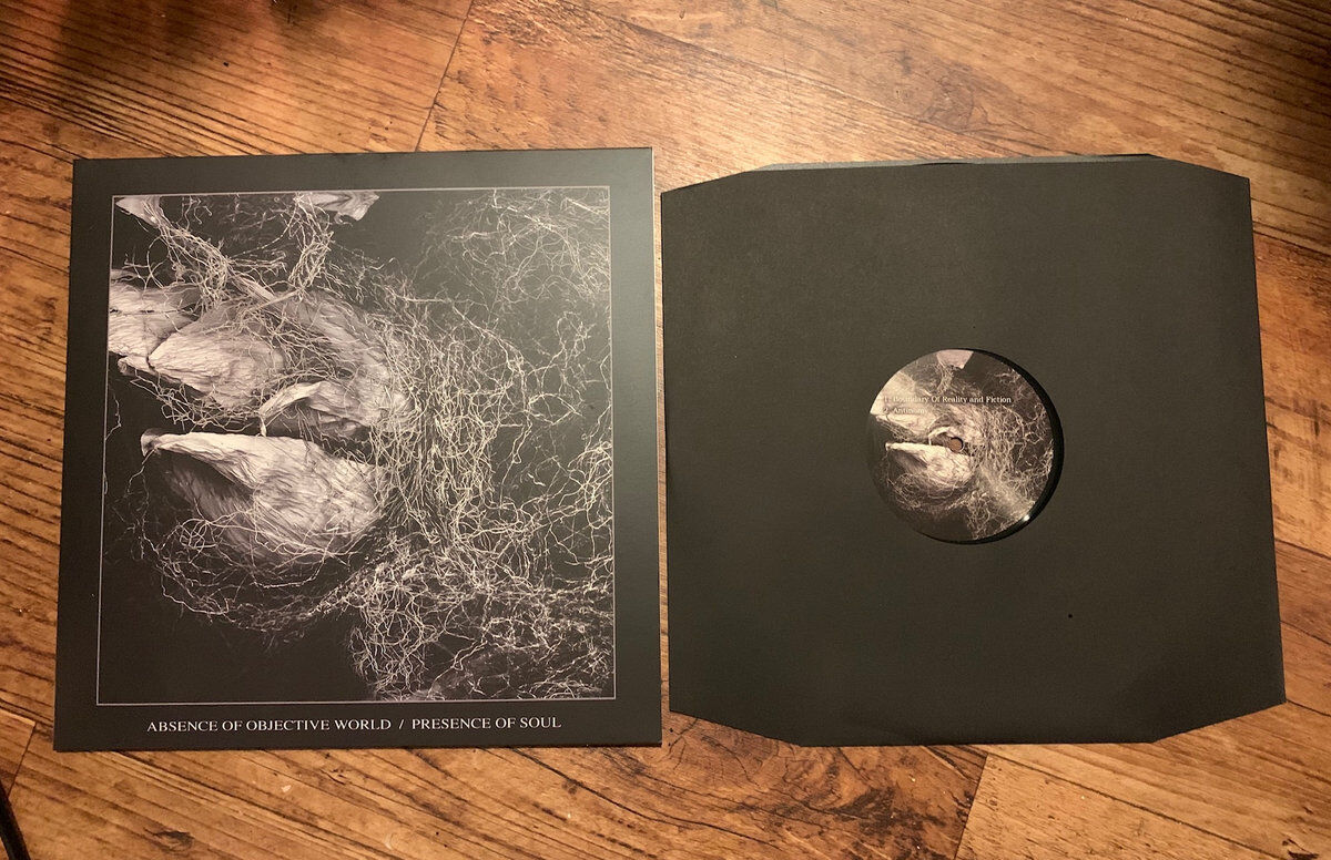 Presence of Soul / Absence of Objective World -