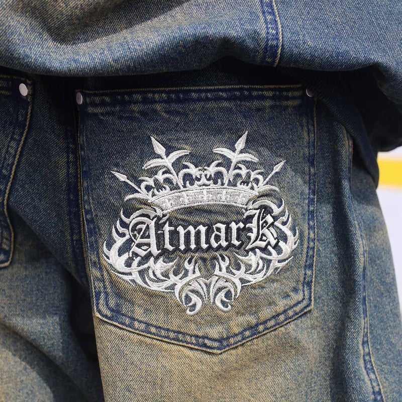 tmark trival crown logo buggy denim pants | @t