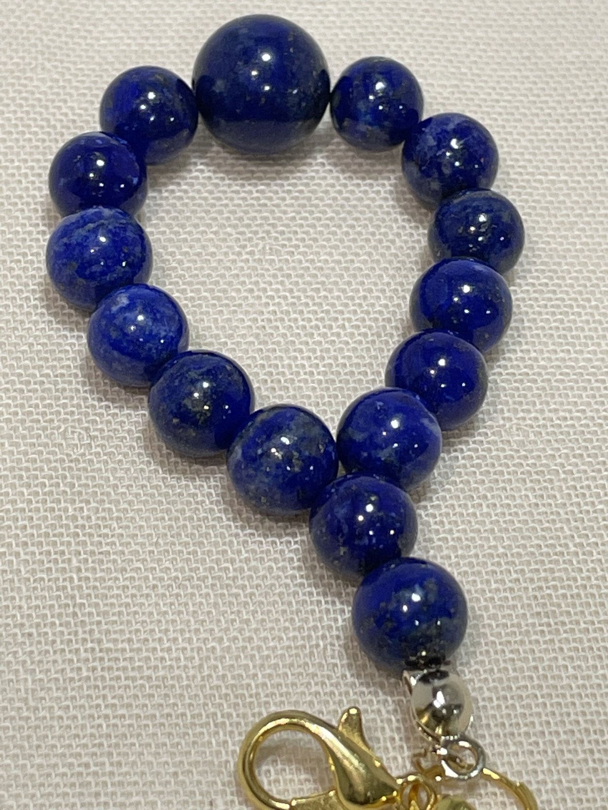 ラピスラズリのお守りストラップ | TIRORI