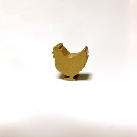 金のメンドリ型コマ