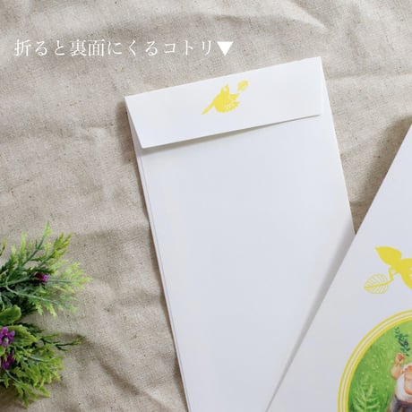 洋6タテ封筒　花を持つ子ども