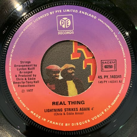 The Real Thing / Lightning Strikes Again (7")