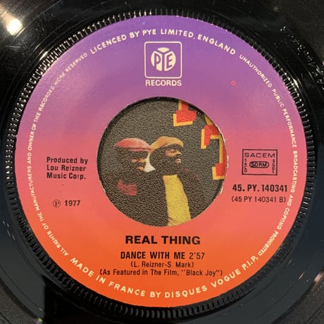 The Real Thing / Lightning Strikes Again (7")