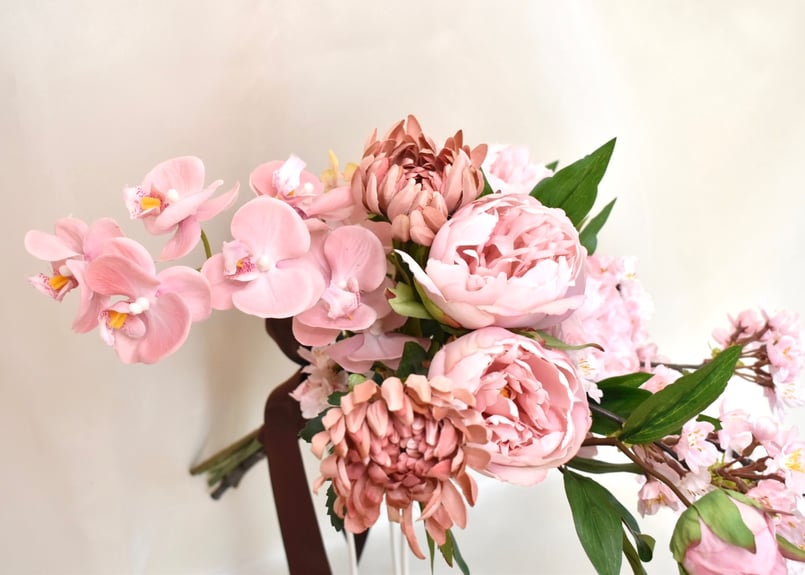 クラッチブーケとブートニア 桜 | Dar flores