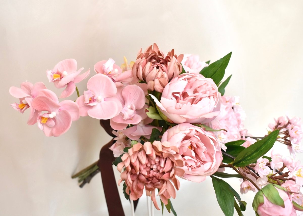 クラッチブーケとブートニア 桜 | Dar flores