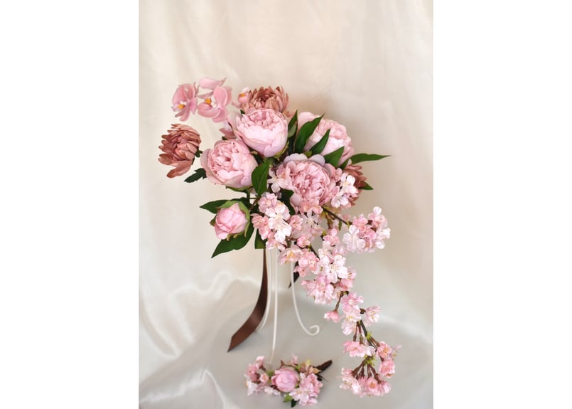 クラッチブーケとブートニア 桜 | Dar flores