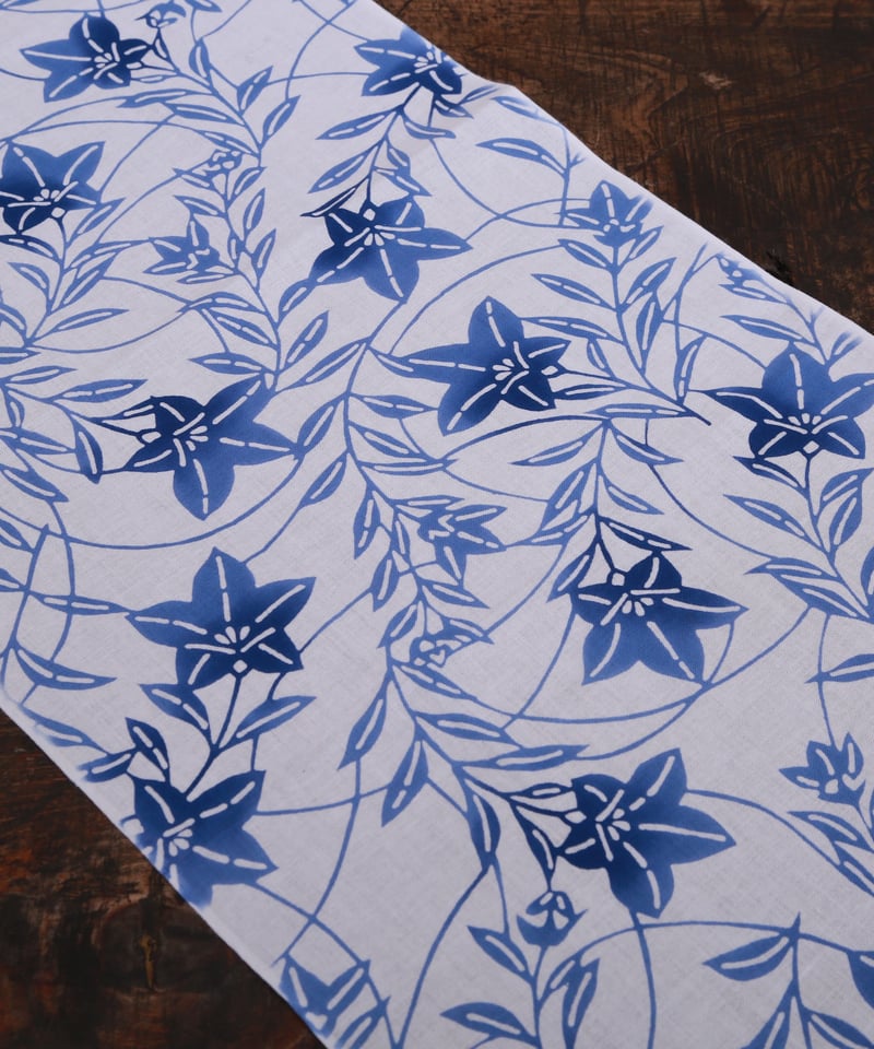 乳白色の地に織り込まれた桔梗が仄かに煌めく美しい夏の名古屋帯です 乳白色の地に織り込まれた桔梗が仄かに煌めく美しい夏の名古屋