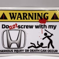 "WARNING" sticker / honda