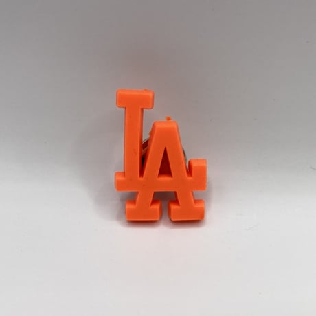 "LA" pins orange