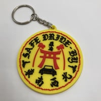 "JINJA" rubber keychain