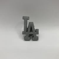 "LA" pins gray