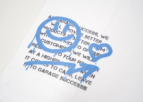 Garage Success ✕ BRASH オリジナルTシャツ 【ニコちゃん】