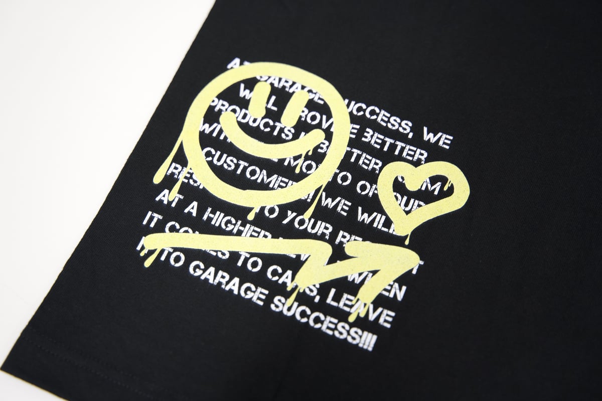Garage Success ✕ BRASH オリジナルTシャツ 【ニコちゃん】 | cust