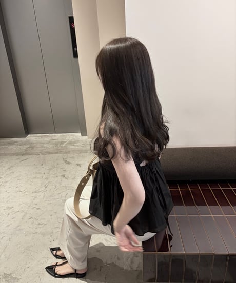 shirred sleeveless blouse