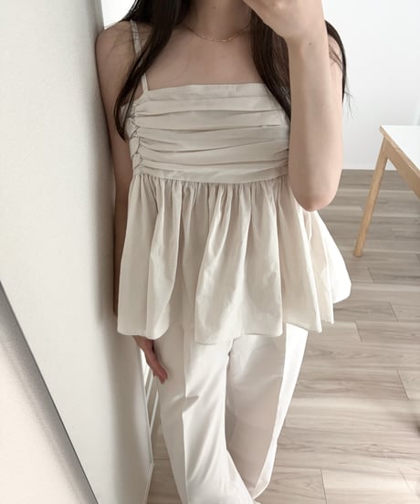 shirred sleeveless blouse