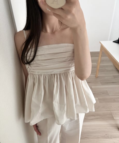 shirred sleeveless blouse