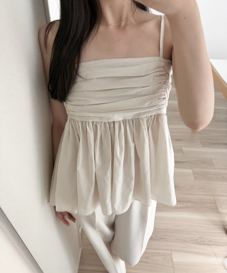 shirred sleeveless blouse