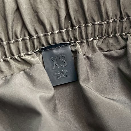 ESSENTIALS NYLON TRACK PANT INK XS 92070