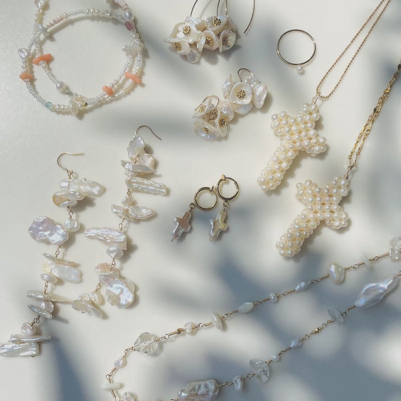 pierce 〗淡水パールクロスのピアス | mer scintillante