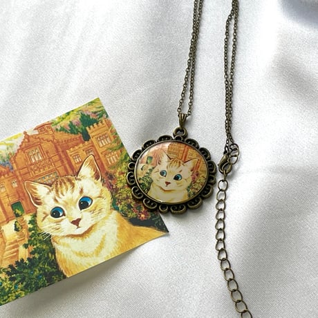 猫の画家ルイス・ウエイン「白猫とオレンジの教会」/アンティーク調ネックレス/ラウンド ブロンズ/世界の名画アクセサリー
