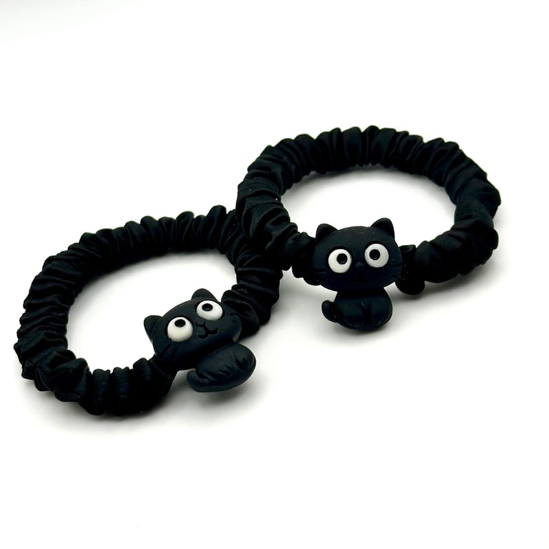 黒猫ヘアゴム2個セット｜ぷっくりフェイスの可愛いペアアクセ