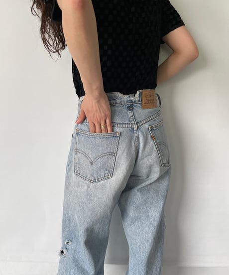 90s Levis 562 damage denim