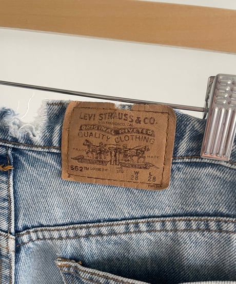 90s Levis 562 damage denim
