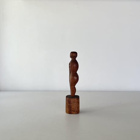 wood carved small woman 30s