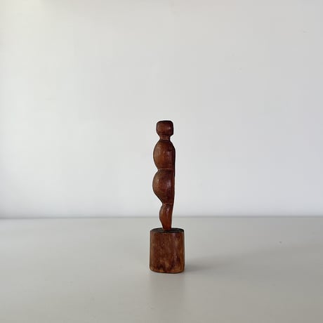 wood carved small woman 30s