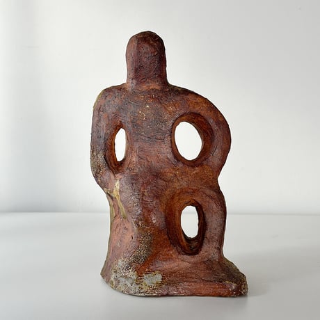 object crouching 70s