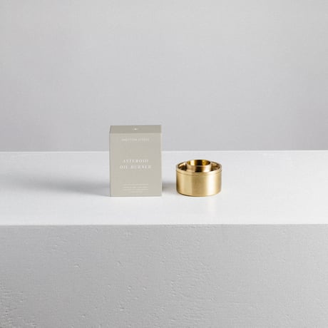 Addition Studio / Asteroid Oil Burner