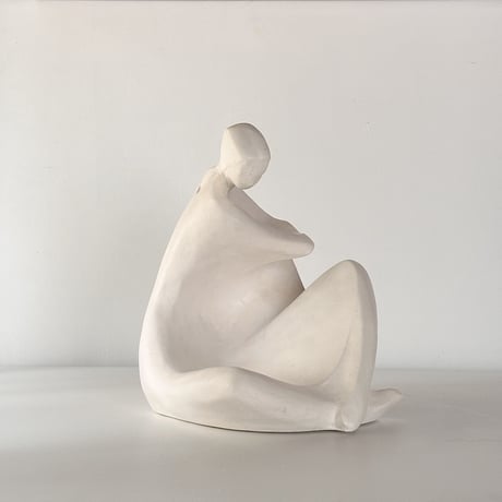 vintage object woman sitting kneel up 80s USA