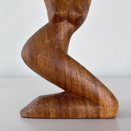 Object woman crouching