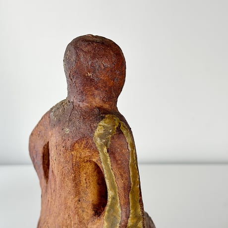 object crouching 70s