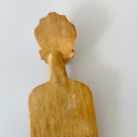 African effigy wooden comb