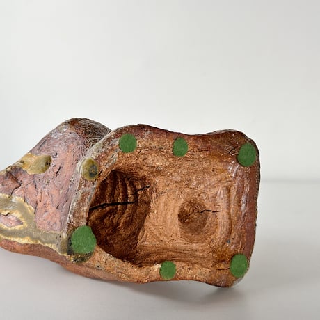 object crouching 70s