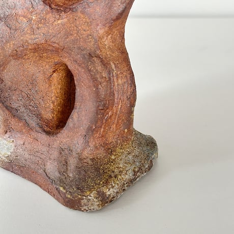 object crouching 70s