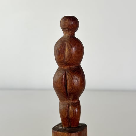 wood carved small woman 30s