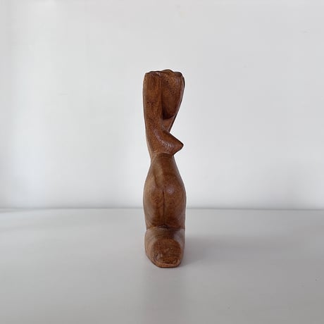 Object woman crouching