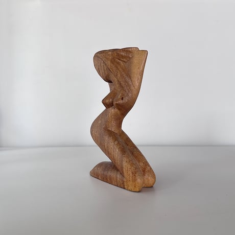 Object woman crouching