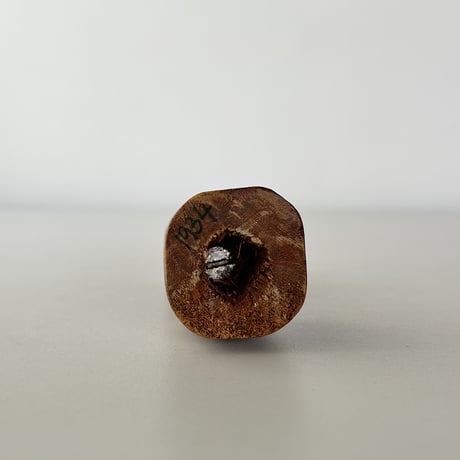 wood carved small woman 30s