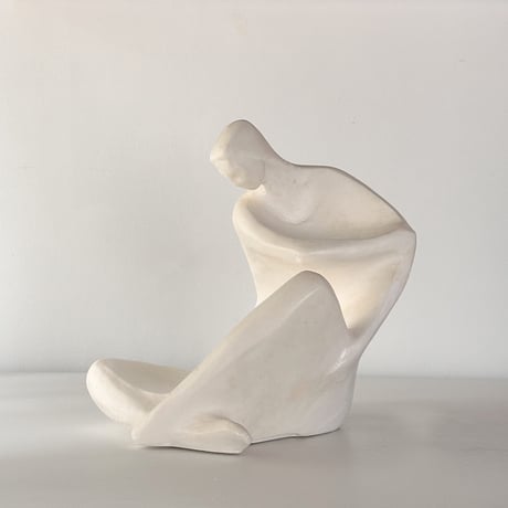 vintage object woman sitting kneel up 80s USA