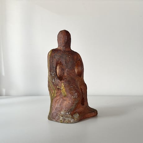 object crouching 70s